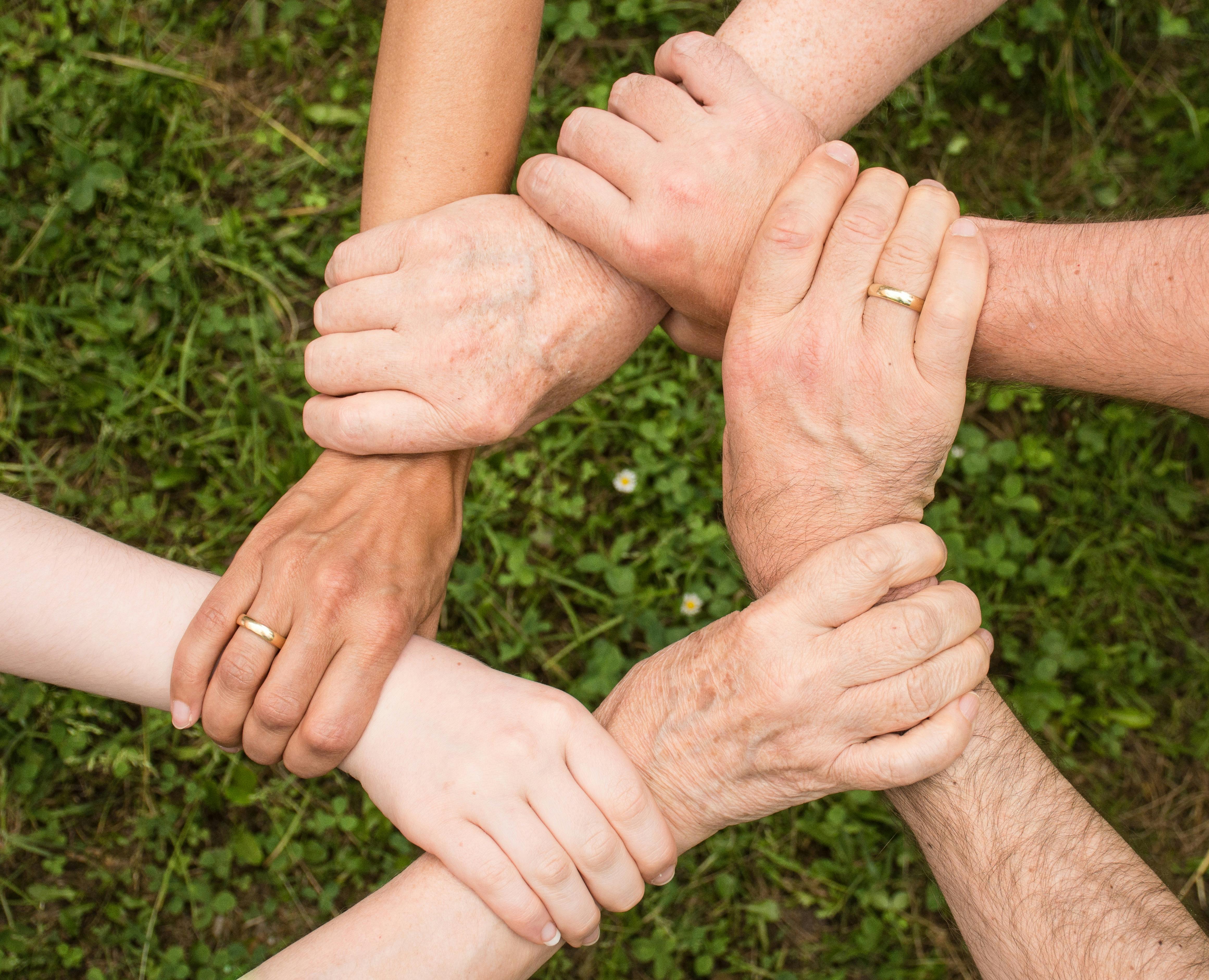 Hands joined together in unity